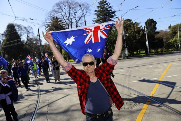 August 30, 2026, Melbourne, Victoria State, Australia: Far-right activists marched through the streets of Melbourne during the rally..Hundreds of supporters of the far-right group March for Australia marched through Melbourneâ€⠢s CBD as part of a demonstration focused on freedom of speech and political expression, while counter-protesters gathered separately to oppose the march and its political messages. March for Australia organisers called for the repeal of laws they say restrict political communication, an end to government censorship and constitutional protection for freedom of speech. Melbourne Australia - ZUMAs197 20260830_aaa_s197_056 Copyright: xYexMyoxKhantx