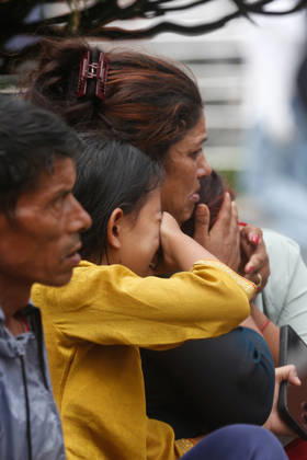 Nepal Floods - Aftermath Relatives of people missing after flash floods in Rasuwa and Nuwakot cry while searching for their loved ones at Tribhuvan University Teaching Hospital on August 30, 2026. Families examine photographs and missing-person notices as search and identification efforts continue. The floods destroyed homes and swept mud and debris downstream along the Trishuli River. Kathmandu Nepal Copyright: xSanjitxPariyarx originalFilename: pariyar-notitle260830_npAlu