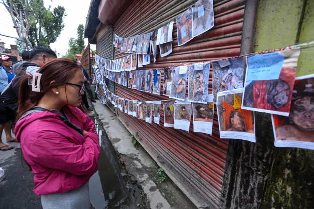 Nepal Floods - Aftermath Relatives of people missing after flash floods in Rasuwa and Nuwakot search for information at Tribhuvan University Teaching Hospital on August 30, 2026. Families examine photographs and missing-person notices, while some mourn and wait for news. The floods destroyed homes and swept debris downstream along the Trishuli River. Kathmandu Nepal Copyright: xSanjitxPariyarx originalFilename: pariyar-notitle260830_npBhz
