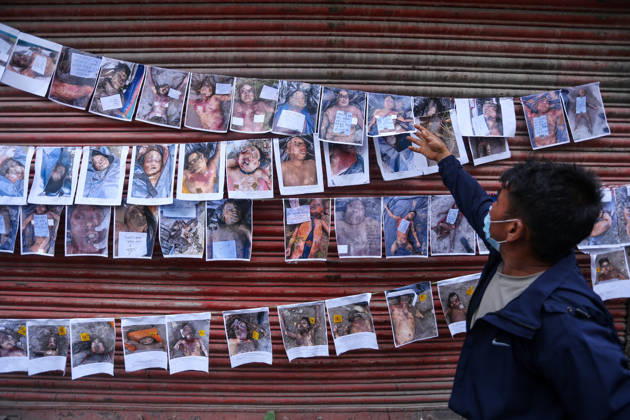 Nepal Floods - Aftermath Relatives of people missing after flash floods in Rasuwa and Nuwakot search for information at Tribhuvan University Teaching Hospital on August 30, 2026. Families examine photographs and missing-person notices, while some mourn and wait for news. The floods destroyed homes and swept debris downstream along the Trishuli River. Kathmandu Nepal  Copyright: xSanjitxPariyarx originalFilename: pariyar-notitle260830_npQcJ.jpg