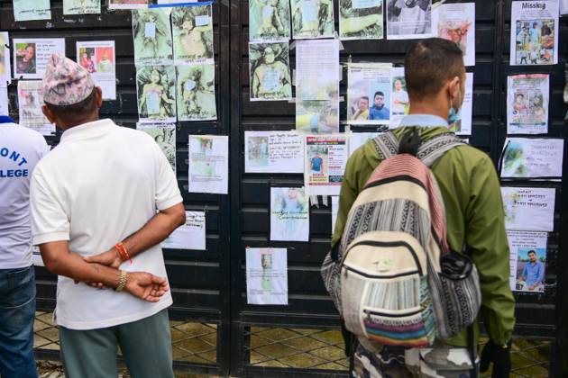 August 30, 2026, Kathmandu, Bagmati, Nepal: KATHMANDU, NEPAL, AUGUST 30, 2026: Relatives search for missing family members at Tribhuvan University Teaching Hospital in Kathmandu, four days after flash floods struck Rasuwa and Nuwakot districts near the Nepal-China border. Families post photographs of missing loved ones on walls and noticeboards and examine missing-person notices as search, rescue and identification efforts continue. The floods swept through communities before surging downstream along the Trishuli River, damaging homes and infrastructure and leaving families awaiting information about those still unaccounted for. Kathmandu Nepal - ZUMAq101 20260830_zna_q101_023 Copyright: xSafalxPrakashxShresthax