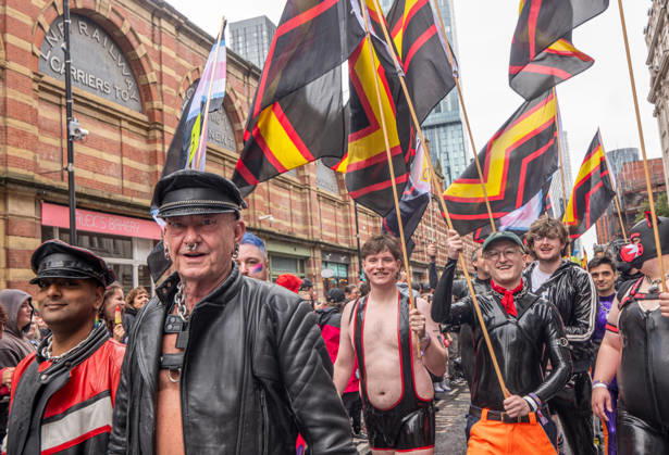 August 29, 2026, Manchester, United Kingdom: Revelers march on the street during the pride parade. Revelers refused to let a heavy downpour dampen their spirits as the annual parade makes its way through the city centre. Despite the torrential rain, the LGBTQ+ community and supporters partied anyway, filling the streets with vibrant colour, music, and joy. The festival has been officially renamed Manchester Village Pride this year, marking a new community-led chapter after the voluntary liquidation and financial collapse of the former organizing company last autumn. Taking part in the celebrations, the newly elected Mayor of Greater Manchester, Bev Craig, actively engaged with parade participants and cheering crowds along the route through  - ZUMAs197 20260829_aaa_s197_374 Copyright: xGaryxRobertsx