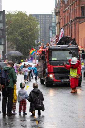 August 29, 2026, Manchester, United Kingdom: A family await the fireman pride group during the pride parade. Revelers refused to let a heavy downpour dampen their spirits as the annual parade makes its way through the city centre. Despite the torrential rain, the LGBTQ+ community and supporters partied anyway, filling the streets with vibrant colour, music, and joy. The festival has been officially renamed Manchester Village Pride this year, marking a new community-led chapter after the voluntary liquidation and financial collapse of the former organizing company last autumn. Taking part in the celebrations, the newly elected Mayor of Greater Manchester, Bev Craig, actively engaged with parade participants and cheering crowds along the rout  - ZUMAs197 20260829_aaa_s197_376 Copyright: xGaryxRobertsx