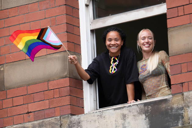 August 29, 2026, Manchester, United Kingdom: Spectators keep dry and watched from windows along the route during the pride parade. Revelers refused to let a heavy downpour dampen their spirits as the annual parade makes its way through the city centre. Despite the torrential rain, the LGBTQ+ community and supporters partied anyway, filling the streets with vibrant colour, music, and joy. The festival has been officially renamed Manchester Village Pride this year, marking a new community-led chapter after the voluntary liquidation and financial collapse of the former organizing company last autumn. Taking part in the celebrations, the newly elected Mayor of Greater Manchester, Bev Craig, actively engaged with parade participants and cheering  - ZUMAs197 20260829_aaa_s197_377 Copyright: xGaryxRobertsx