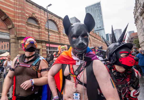 August 29, 2026, Manchester, United Kingdom: Human pups join the parade. Revelers refused to let a heavy downpour dampen their spirits as the annual parade makes its way through the city centre. Despite the torrential rain, the LGBTQ+ community and supporters partied anyway, filling the streets with vibrant colour, music, and joy. The festival has been officially renamed Manchester Village Pride this year, marking a new community-led chapter after the voluntary liquidation and financial collapse of the former organizing company last autumn. Taking part in the celebrations, the newly elected Mayor of Greater Manchester, Bev Craig, actively engaged with parade participants and cheering crowds along the route through central Manchester towards  - ZUMAs197 20260829_aaa_s197_381 Copyright: xGaryxRobertsx