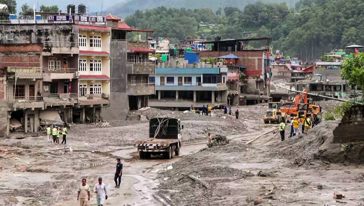RECORD DATE NOT STATED Heavy Machinery Clears Mud and Debris from Flood-Damaged Residential Area in Nuwakot Nuwakot Nepal , Aug 30 (ANI): Heavy machinery, including excavators and trucks, clears thick mud and debris from a residential area damaged by a devastating flood, as workers assess the site amid ongoing cleanup operations at Trishuli, in Nuwakot on Sunday. (ANI Video Grab) Nuwakot Nepal Copyright: xANIx ANI_20260830157