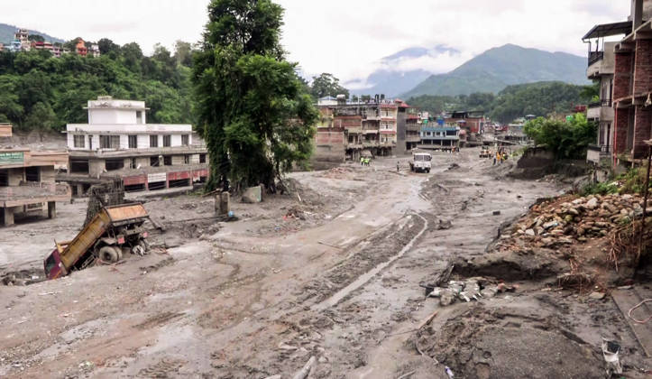 RECORD DATE NOT STATED Flood Leaves Mud-Covered Streets and Overturned Truck in Nuwakot Nuwakot Nepal , Aug 30 (ANI): A mud-covered street lined with buildings shows the aftermath of a devastating flood, with an overturned truck and ongoing debris clearance efforts visible in the area at Trishuli, in Nuwakot on Sunday. (ANI Video Grab) Nuwakot Nepal Copyright: xANIx ANI_20260830159
