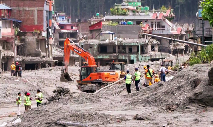 RECORD DATE NOT STATED Debris Clearance Underway in Flood-Damaged Residential Area in Nuwakot Nuwakot Nepal , Aug 30 (ANI): Debris being cleared from a residential area damaged by a devastating flood, with heavy machinery including excavators and trucks deployed for ongoing cleanup operations at Trishuli, in Nuwakot on Sunday. (ANI Video Grab) Nuwakot Nepal Copyright: xANIx ANI_20260830173