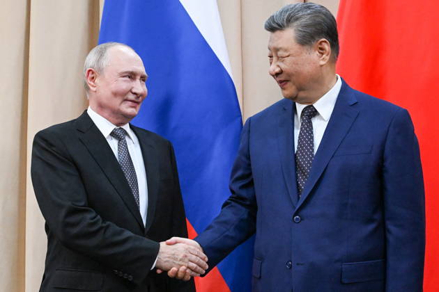 KYRGYZSTAN, BISHKEK - AUGUST 31, 2026: Russia’s President Vladimir Putin (L) and China s President Xi Jinping shake hands during a meeting at the Hyatt Regency Bishkek Hotel ahead of the 2026 SCO Summit. Konstantin Zavrazhin POOL TASS  96904250