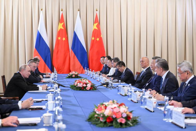KYRGYZSTAN, BISHKEK - AUGUST 31, 2026: Russia’s President Vladimir Putin (L) and China s President Xi Jinping (3rd R) are seen during a meeting at the Hyatt Regency Bishkek Hotel on the sidelines of the 2026 SCO Summit. Kristina Solovyova POOL TASS  96904943