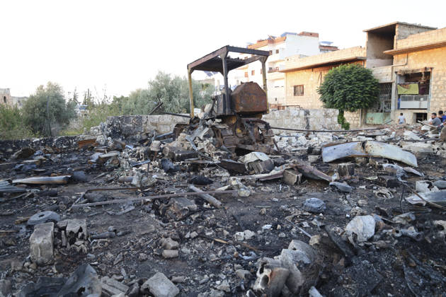 Binnish Syria Ammunition Explosion A damaged vehicle stands amid widespread debris at the site of an explosion in Binnish, Idlib Governorate, Syria, on September 1, 2026. Five people were killed and several others injured when a vehicle loaded with ammunition exploded in Binnish, according to Syrian authorities, while the cause remained unclear and emergency crews worked to secure scattered munitions and prevent further explosions. Binnish Idlib Syria Copyright: xOmarxAlbawx