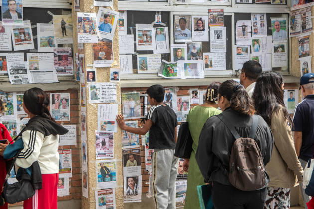 September 1, 2026, Kathmandu, Nepal: Relatives of missing persons inspect notice boards displayed with photos and details at Tribhuvan University Teaching Hospital in Kathmandu. Hundreds remain unaccounted for following severe flash floods caused by a glacial outburst along the Tibet-Nepal border on August 26. Kathmandu Nepal - ZUMAs197 20260901_aaa_s197_201 Copyright: xAmitxShuklax