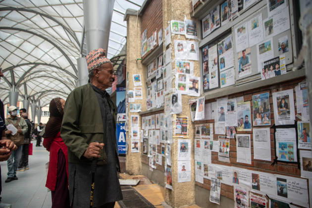 September 1, 2026, Kathmandu, Nepal: Relatives of missing persons inspect notice boards displayed with photos and details at Tribhuvan University Teaching Hospital in Kathmandu. Hundreds remain unaccounted for following severe flash floods caused by a glacial outburst along the Tibet-Nepal border on August 26. Kathmandu Nepal - ZUMAs197 20260901_aaa_s197_205 Copyright: xAmitxShuklax