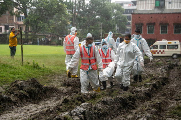 September 1, 2026, Kathmandu, Nepal: Bodies of unidentified victims wrapped in shrouds lie at a temporary burial trench in Gokarna, Kathmandu. Emergency teams collected DNA samples and forensic records prior to interment to assist family identification efforts later. Kathmandu Nepal - ZUMAs197 20260901_aaa_s197_232 Copyright: xAmitxShuklax