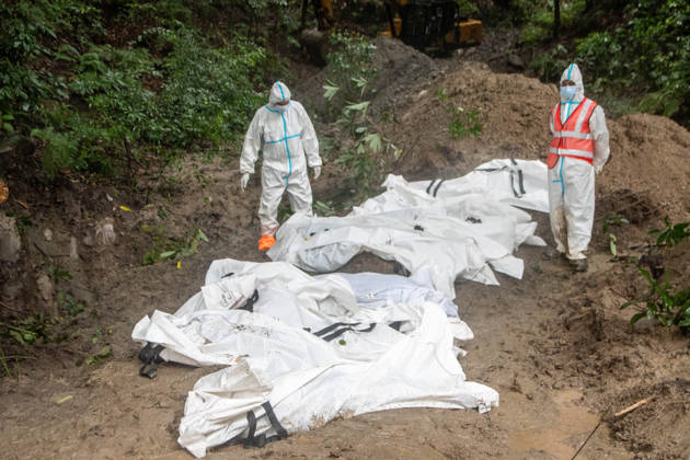 September 1, 2026, Kathmandu, Nepal: Bodies of unidentified victims wrapped in shrouds lie at a temporary burial trench in Gokarna, Kathmandu. Emergency teams collected DNA samples and forensic records prior to interment to assist family identification efforts later. Kathmandu Nepal - ZUMAs197 20260901_aaa_s197_236 Copyright: xAmitxShuklax