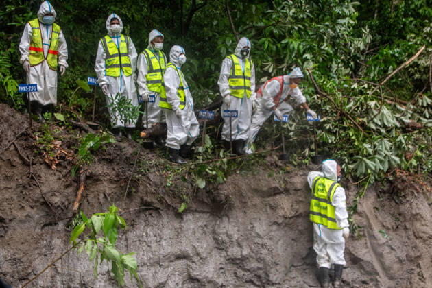 September 1, 2026, Kathmandu, Nepal: Rescue workers and officials manage a mass burial trench for unidentified remains recovered after severe flash floods in Gokarna, Kathmandu. Kathmandu Nepal - ZUMAs197 20260901_aaa_s197_240 Copyright: xAmitxShuklax