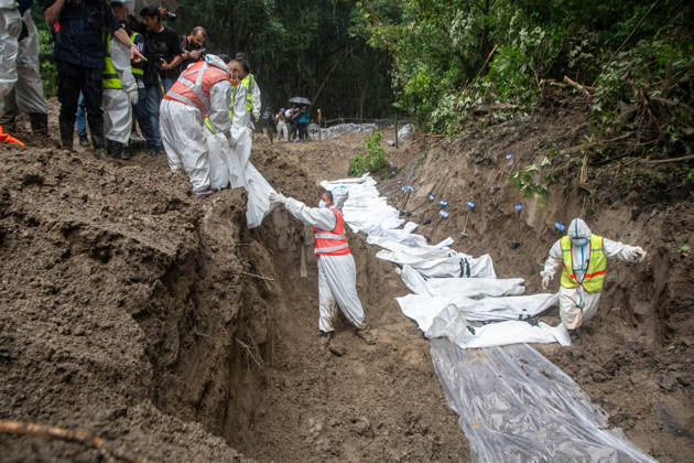 September 1, 2026, Kathmandu, Nepal: Bodies of unidentified victims wrapped in shrouds lie at a temporary burial trench in Gokarna, Kathmandu. Emergency teams collected DNA samples and forensic records prior to interment to assist family identification efforts later. Kathmandu Nepal - ZUMAs197 20260901_aaa_s197_244 Copyright: xAmitxShuklax