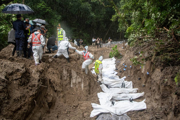 September 1, 2026, Kathmandu, Nepal: Bodies of unidentified victims wrapped in shrouds lie at a temporary burial trench in Gokarna, Kathmandu. Emergency teams collected DNA samples and forensic records prior to interment to assist family identification efforts later. Kathmandu Nepal - ZUMAs197 20260901_aaa_s197_249 Copyright: xAmitxShuklax