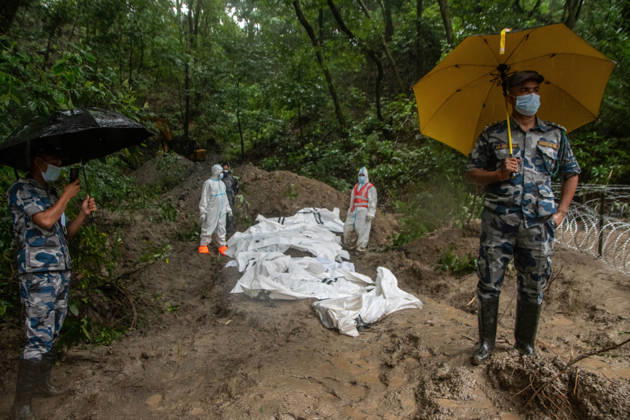 September 1, 2026, Kathmandu, Nepal: Bodies of unidentified victims wrapped in shrouds lie at a temporary burial trench in Gokarna, Kathmandu. Emergency teams collected DNA samples and forensic records prior to interment to assist family identification efforts later. Kathmandu Nepal - ZUMAs197 20260901_aaa_s197_255 Copyright: xAmitxShuklax
