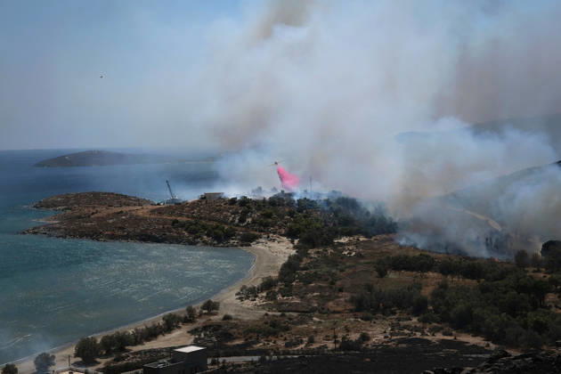 Wildfire near Karystos on Greece s Evia Island EVIA, GREECE - SEPTEMBER 2: Firefighting airplane drops water, as a wildfire burns near Karystos on the island of Evia, Greece, on September 2, 2026 Costas Baltas Anadolu Evia Greece. Editorial use only. Please get in touch for any other usage.  Copyright: x2026xAnadoluxCostasxBaltasx