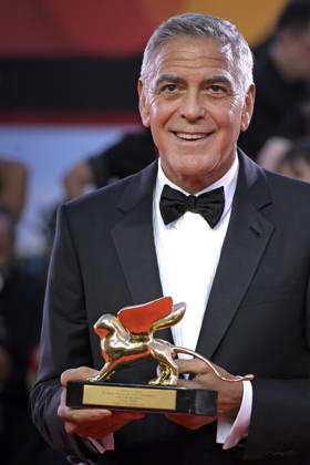 George Clooney poses on the red carpet after receiving the Golden Lion for Lifetime Achievement Award during the Opening Ceremony the 83rd Venice International Film Festival at Sala Grande on September 2, 2026 in Venice, Italy.  VFF20260902863 RoccoxSpaziani