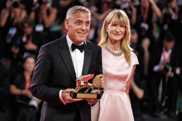 September 2, 2026, Venice, Italy: American actor and producer, George Clooney and american actress, Laura Dern seen holding the Honorary Golden Lion Award at the 83rd Venice International Film Festival at the Palazzo del Cinema. Venice Italy - ZUMAs197 20260902_aaa_s197_507 Copyright: xMarcoxBaradax