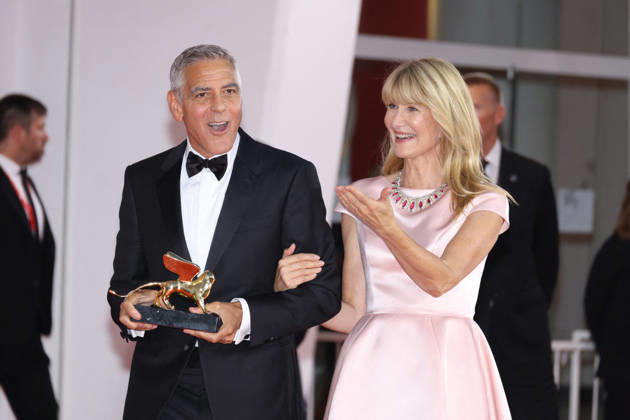Venise 2026 Ink Screening George Clooney Golden Lion NB George Clooney poses with Laura Dern after receiving the Golden Lion for Lifetime Achievement Award attending the Ink Red carpet Opening Ceremony as part of the 83th Venice International Film Festival at the Lido in Venice, Italy on September 02, 2026. Photo by Nasser Berzane ABACAPRESS.COM Venise Copyright: xBerzanexNasser ABACAx