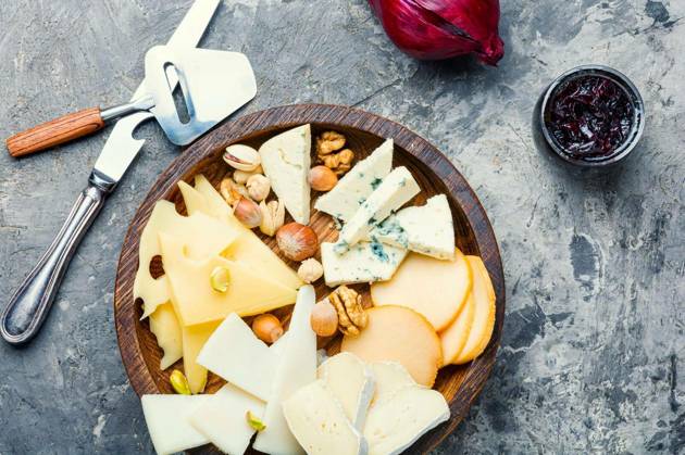 Cheese on the table.various types of cheese on old rustic wooden table Copyright: xLMykolax Panthermedia78525740