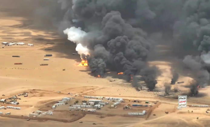 (260908) -- HADRAMOUT, Sept. 8, 2026 -- A screenshot shows trucks burning after they were targeted by ballistic missiles launched by Houthi group near Al-Wadiah military camp in Hadramout province, Yemen on Sept. 7, 2026. Yemen s Houthi group said Monday that it had carried out a ballistic missile strike on trucks it claimed were transporting military equipment from Saudi Arabia to the Al-Wadiah military camp in Yemen s government-controlled southeastern province of Hadramout. (Houthi Media Center Handout via Xinhua) YEMEN-HADRAMOUT-HOUTHI GROUP-MILITARY TRUCKS-ATTACK Mohammed 
