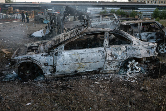 Cars that caught fire as a result of a Russian attack are in a parking lot in the Podilskyi district, Kyiv, Ukraine, September 8, 2026. On Tuesday night, September 8, Russian forces launched another massive strike on the Ukrainian capital with ballistic and cruise missiles, as well as jet UAVs. The attack caused significant damage to civilian infrastructure, residential areas, and business facilities. Three people were killed, and 19 were injured. (Photo by Danylo Antoniuk Ukrinform) Destruction and fires reported across Kyiv districts after Russian attack Copyright: xDanyloxAntoniukx