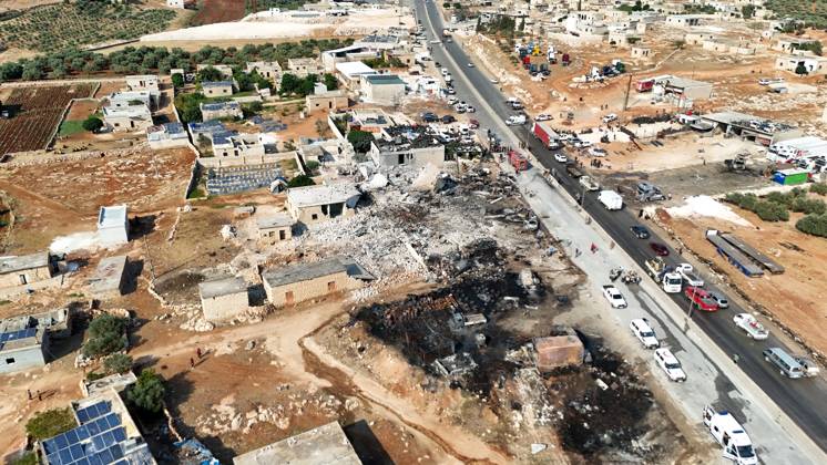 (260909) -- SYRIA, Sept. 9, 2026 -- An aerial drone photo shows a view of the site of an explosion at an ammunition storage site near the city of Sarmada in Syria s northwestern Idlib province, Sept. 9, 2026. At least three people were killed and more than 10 others injured on Wednesday in the explosion, according to preliminary reports. (Str Xinhua) SYRIA-IDLIB-AMMUNITION DEPOT-EXPLOSION Stringer 