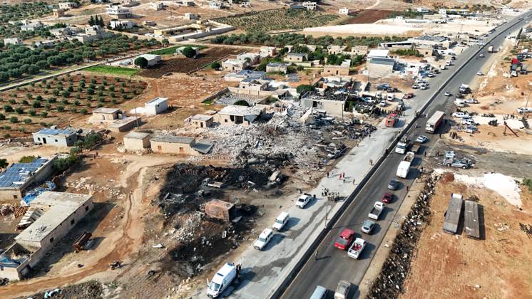 (260909) -- SYRIA, Sept. 9, 2026 -- An aerial drone photo shows a view of the site of an explosion at an ammunition storage site near the city of Sarmada in Syria s northwestern Idlib province, Sept. 9, 2026. At least three people were killed and more than 10 others injured on Wednesday in the explosion, according to preliminary reports. (Str Xinhua) SYRIA-IDLIB-AMMUNITION DEPOT-EXPLOSION Stringer 