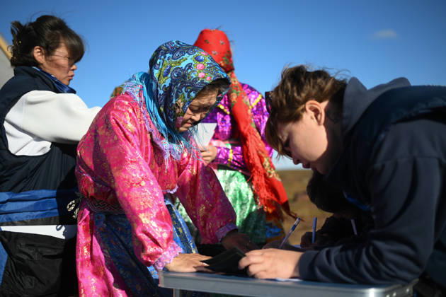 Russia Parliamentary Election Early Voting 9239446 09.09.2026 Members of a local indigenous community prepare to vote during the early voting in remote areas ahead of State Duma elections at a reindeer camping ground, in Yamalo-Nenets Autonomous Area, Russia. Russians will vote in State Duma, the lower house of parliament, and municipal elections over three days, from September 18-20. Alexandr Kryazhev Sputnik Yamalo-Nenets Autonomous Area Russia  Copyright: xAlexandrxKryazhevx