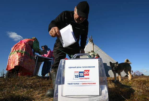 Russia Parliamentary Election Early Voting 9239453 09.09.2026 A member of a local indigenous community casts his ballot during the early voting in remote areas ahead of State Duma elections at a reindeer camping ground, in Yamalo-Nenets Autonomous Area, Russia. Russians will vote in State Duma, the lower house of parliament, and municipal elections over three days, from September 18-20. Alexandr Kryazhev Sputnik Yamalo-Nenets Autonomous Area Russia  Copyright: xAlexandrxKryazhevx