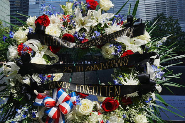 September 9, 2026, New York, New York, USA: A memorial and flower arrangement to the NYPD along the South Tower reflecting pool ahead of the 25th anniversary of the attacks of September 11 at the 9 11 Memorial on September 9, 2026 in New York. New York USA - ZUMAb148 20260909_zap_b148_008 Copyright: xBryanxSmithx