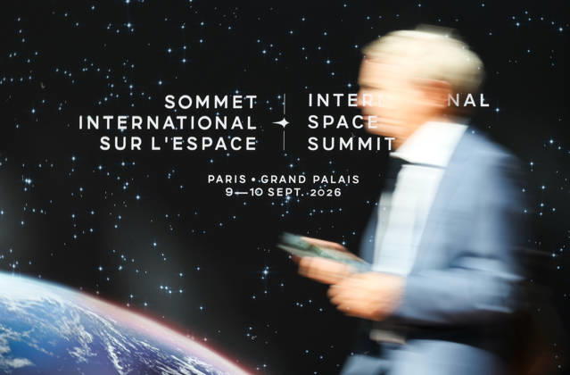 (260909) -- PARIS, Sept. 9, 2026 -- A visitor passes the logo of the International Space Summit at the Grand Palais in Paris, France, Sept. 9, 2026. The first International Space Summit opened Wednesday in Paris, bringing together heads of state and government, scientists, astronauts and industry representatives. ) FRANCE-PARIS-INTERNATIONAL SPACE SUMMIT WuxHuiwo 