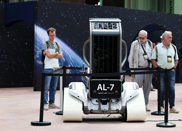 (260909) -- PARIS, Sept. 9, 2026 -- Visitors check an exhibit during the International Space Summit at the Grand Palais in Paris, France, Sept. 9, 2026. The first International Space Summit opened Wednesday in Paris, bringing together heads of state and government, scientists, astronauts and industry representatives. ) FRANCE-PARIS-INTERNATIONAL SPACE SUMMIT WuxHuiwo 