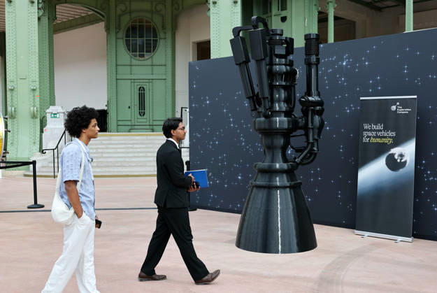 (260909) -- PARIS, Sept. 9, 2026 -- Visitors check an exhibit during the International Space Summit at the Grand Palais in Paris, France, Sept. 9, 2026. The first International Space Summit opened Wednesday in Paris, bringing together heads of state and government, scientists, astronauts and industry representatives. ) FRANCE-PARIS-INTERNATIONAL SPACE SUMMIT WuxHuiwo 