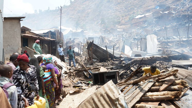 (260910) -- BUKAVU, Sept. 10, 2026 -- People gather at a fire site in Bukavu, Democratic Republic of the Congo, Sept. 10, 2026. At least 21 students were killed and several others seriously injured in a fire that broke out Thursday in Bukavu, capital of the eastern Democratic Republic of the Congo (DRC) s South Kivu Province, local media reported. (SpotNews) DR CONGO-BUKAVU-FIRE-AFTERMATH XinxHuashe 