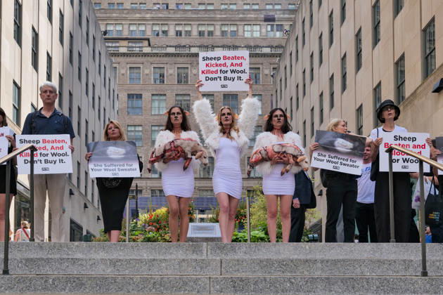 September 10, 2026, New York, New York, USA: PETA protests NYFW at Rockefeller Center with a grisly display dressed.as bruised and bloody sheep outside the venue with lifelike dead lambs.and the message Wool Kills . The graphic protest over wool farms cruelty claims .inhumane wool shearing and terrified sheep. New York USA  - ZUMAh156 20260910_znp_h156_003 Copyright: xMiloxHessx