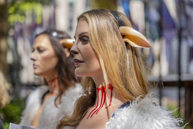 September 10, 2026, New York, New York, USA: PETA protests NYFW at Rockefeller Center with a grisly display dressed.as bruised and bloody sheep outside the venue with lifelike dead lambs.and the message Wool Kills . The graphic protest over wool farms cruelty claims .inhumane wool shearing and terrified sheep. New York USA  - ZUMAh156 20260910_znp_h156_007 Copyright: xMiloxHessx
