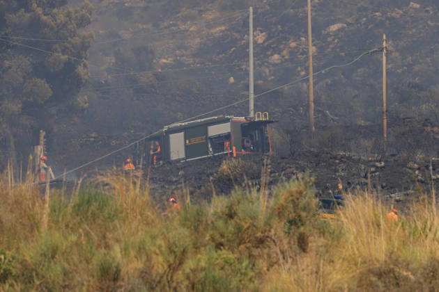 Wildfire near Palermo threatens homes in Giardinello, Sicily PALERMO, ITALY - SEPTEMBER 10: Flames and thick smoke rise from a forested area during a wildfire near Giardinello, close to Palermo on the island of Sicily, on September 10, 2026 in Palermo, Italy. The blaze began in the Carcatizzi area around midday a day earlier and spread rapidly, threatening nearby residential areas and damaging several homes. Firefighters battled the fire from the ground with fire engines and from the air with a firefighting aircraft and two helicopters. Alberto Lo Bianco Anadolu Sicily Italy. Editorial use only. Please get in touch for any other usage.  Copyright: x2026xAnadoluxAlbertoxLoxBiancox