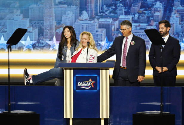 Jessica Gorman shows the shoes her daughter used to wear as she and her family speak about the murder of Sheridan Gorman, as Rep. Mike Lawler listens, on the second day of the Republican midterm convention at American Airlines Center in Dallas, Texas, on Thursday, September 10, 2026.  DAL20260910874 IANxHALPERIN