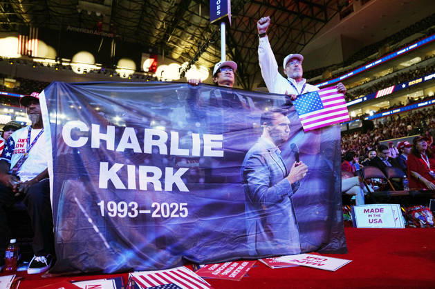 Attendees hold a poster commemorating slain conservative activist Charlie Kirk during the second day of the Republican midterm convention at American Airlines Center in Dallas, Texas, on Thursday, September 10, 2026.  DAL20260910918 BONNIExCASH