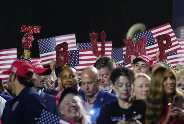 Delegates hold up letters reading TRUMP as Vice President JD Vance makes a keynote address during the second night of the Republican midterm convention at the American Airlines Center in Dallas, Texas, on Thursday, September 10, 2026.  DAL20260910935 BONNIExCASH