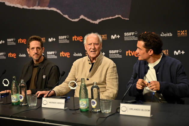 Werner Herzog Receives the Donostia Award at the San Sebastián Film Festival Director, screenwriter, producer, and actor Werner Herzog (c), accompanied by producer Ariel Leon Isacovitch (I) and actor Orlando Bloom (d), speaks with the media before receiving the Donostia Award, at the Kursaal on September 18, 2026, in San Sebastián, Guipúzcoa, Basque Country, Spain. Director, screenwriter, producer, and actor Werner Herzog will receive the Donostia Award in recognition of his career during the opening gala of the San Sebastián Film Festival, which will take place September 18–26 for its 74th edition. The Festival’s highest honorary distinction for the German filmmaker will be accompanied by a screening of his new feature film, ‘Bucking Fast Copyright: xArnaitzxRubiox 7783870