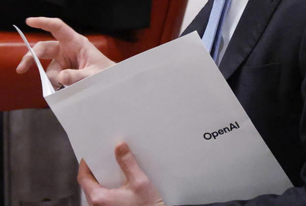 CEO of OpenAI Sam Altman holds an OpenAI folder when he arrives at a United Nations Security Council meeting on artificial intelligence (AI) and international security under Maintenance of International Peace and Security at the UN General Assembly 81st session General Debate at the United Nations Headquarters on Wednesday, September 23, 2026 in New York City.  NYP202609232056 JOHNxANGELILLO