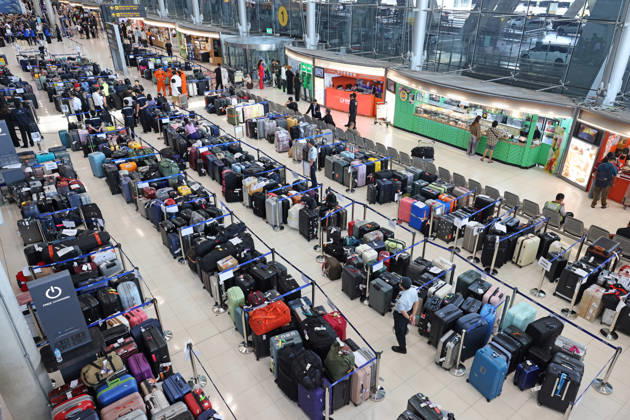 Backlog of luggage at Suvarnabhumi Airport after flood delays, Bangkok, Thailand - 29th September 2026 Piles of luggage at Suvarnabhumi Airport in Bangkok, Thailand, after flooding caused staff shortages to deal with the backlog of bags and suitcases arriving on scheduled flights. Bangkok Thailand Copyright: xPaulxBrownx
