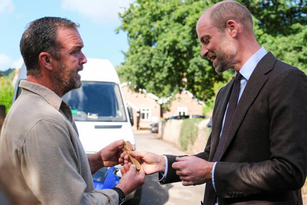 Britain s Prince William visits flood-affected communities in Skenfrith Britain s Prince William, Prince of Wales, is presented with a carved Welsh spoon by Rob Wyatt as he meets local residents to hear about the impact of flooding on their community during a visit focused on flood risk and climate resilience, in Skenfrith, Wales, Britain, October 1, 2026. REUTERS Mathieu, Credit:Mathieu Willcocks PA ROTA - B68 Avalon UNITED KINGDOM, SKENFRITH Copyright: xMathieuxWillcocksx xPAxROTAx-xB68x xAvalonx 1139786058