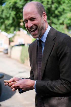 Britain s Prince William visits flood-affected communities in Skenfrith Britain s Prince William, Prince of Wales, reacts after receiving a carved Welsh Spoon, as he meets local residents to hear about the impact of flooding on their community, during a visit focused on flood risk and climate resilience, in Skenfrith, Wales, Britain, October 1, 2026. REUTERS Mathieu Willcocks Pool REFILE - ADDS INFORMATION ABOUT THE SPOON, Credit:Mathieu Willcocks PA ROTA - B68 Avalon UNITED KINGDOM, SKENFRITH  Copyright: xMathieuxWillcocksx xPAxROTAx-xB68x xAvalonx 1139786089